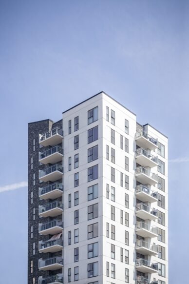 vertical shot of a white building under the clear sky
